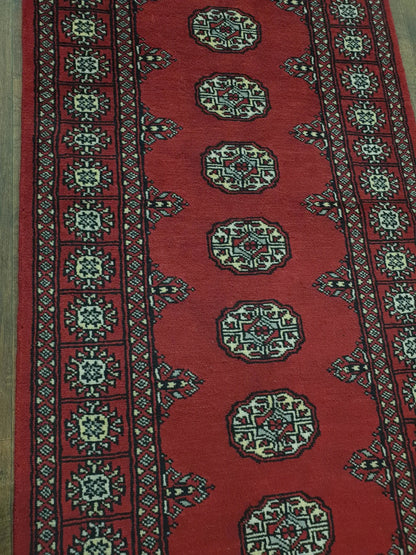 Bokhara hand-knotted wool runner rug 249 x 77 cm field and border detail