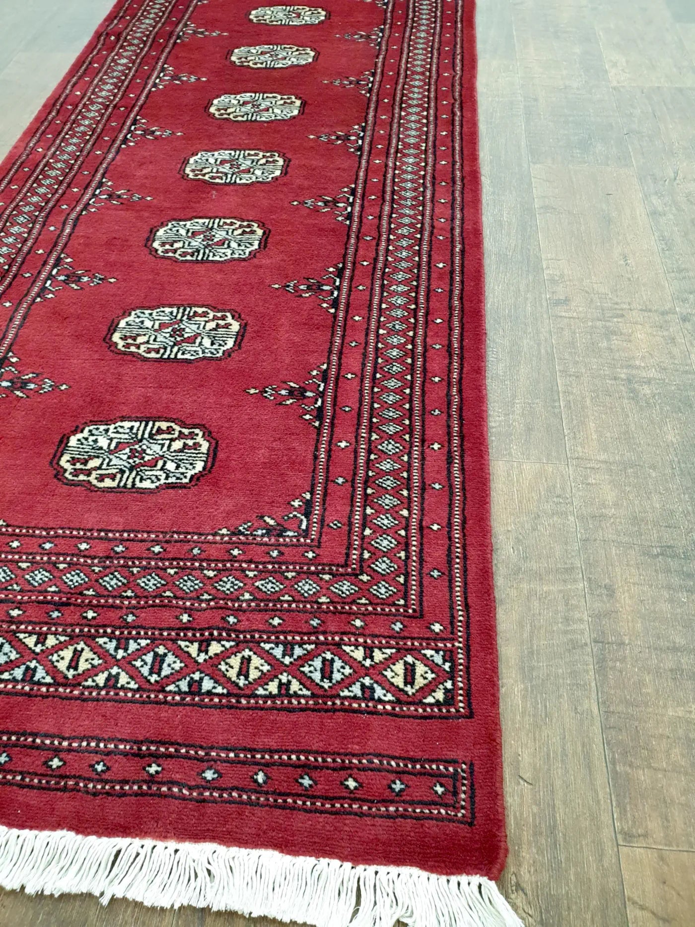 Bokhara runner rug red gul pattern detail