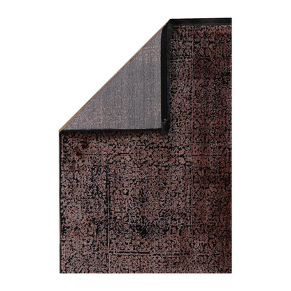 Folded corner detail of Brooklyn 100 copper mosaic rug showing edge and backing texture