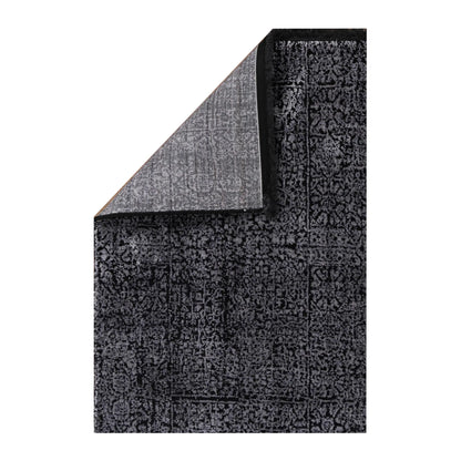Folded corner detail of Brooklyn 100 silver mosaic rug showing edge and backing texture