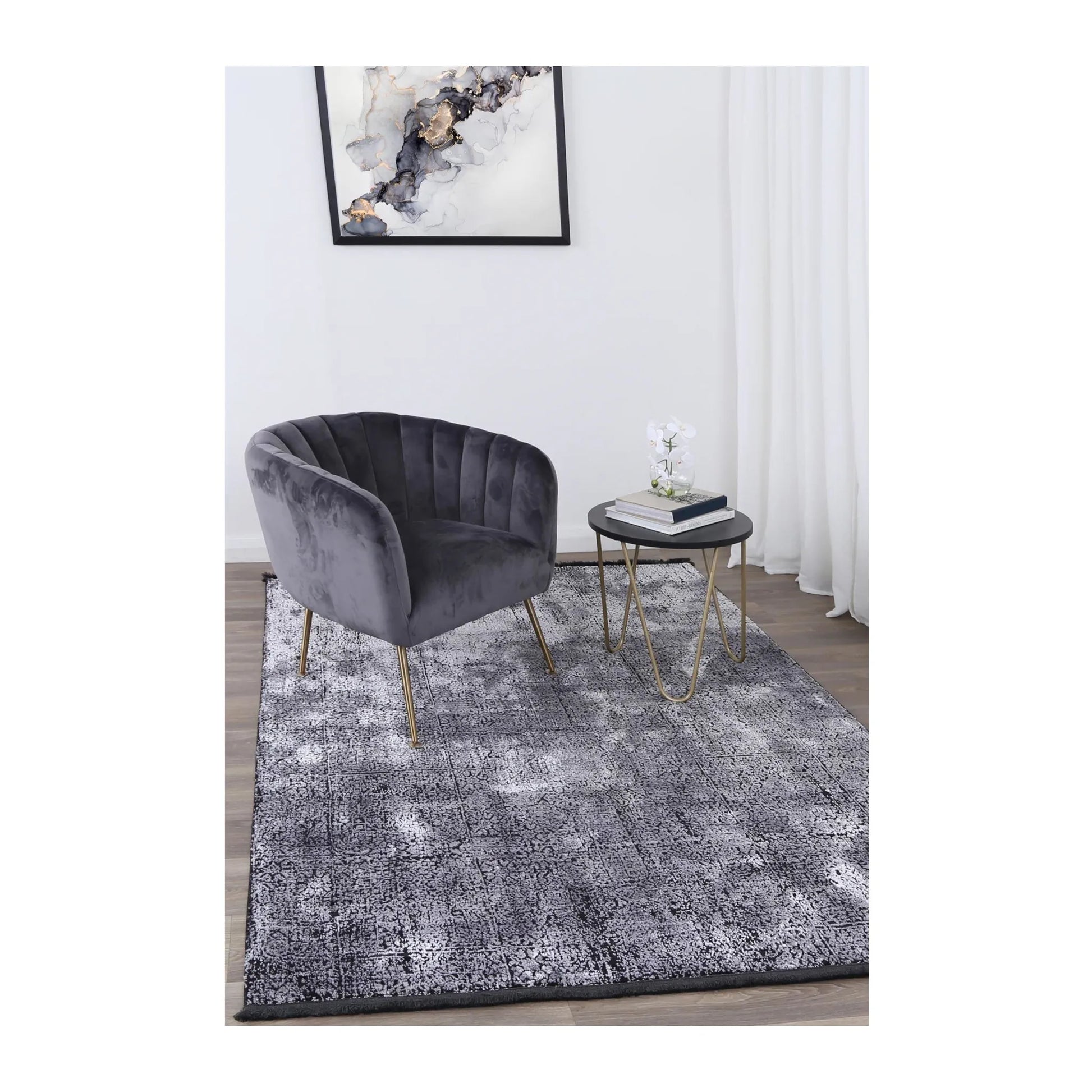 Brooklyn 100 silver mosaic modern rug styled with charcoal chair and side table