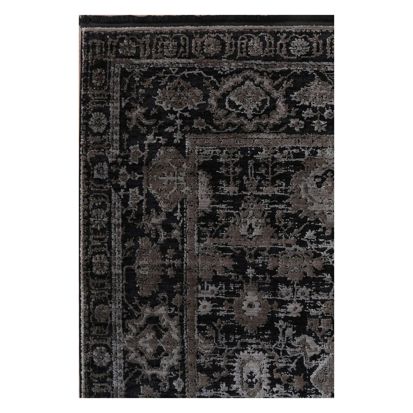 Close view of the raised pewter floral pattern, charcoal field and layered border detail