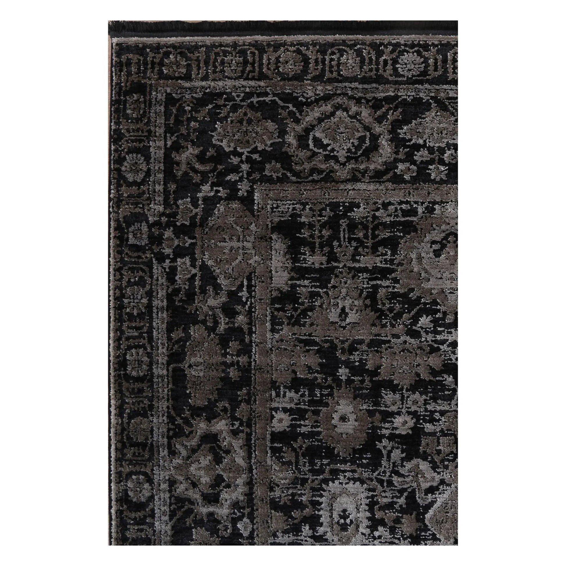 Close view of the raised pewter floral pattern, charcoal field and layered border detail