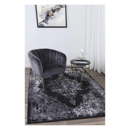 Brooklyn 400 silver medallion modern rug styled with charcoal chair and side table