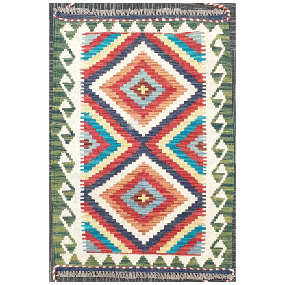 Full view of Chobi Kilim rug with stepped diamond geometric pattern in ivory, blue, red, and green, 92 x 62 cm