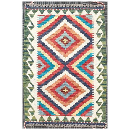 Full view of Chobi Kilim rug with stepped diamond geometric pattern in ivory, blue, red, and green, 92 x 62 cm