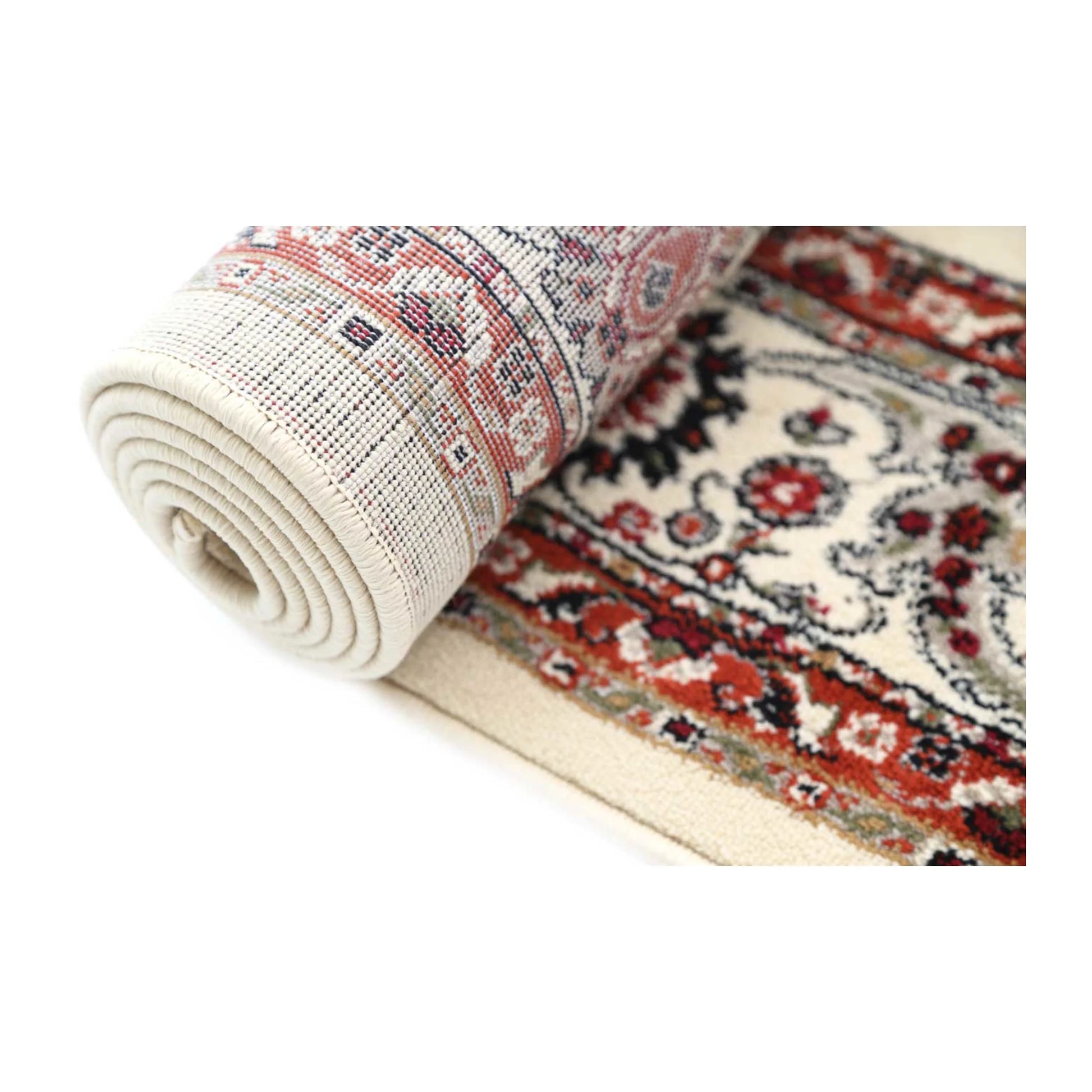 Rolled detail of Classica cream floral rug showing surface pattern and backing