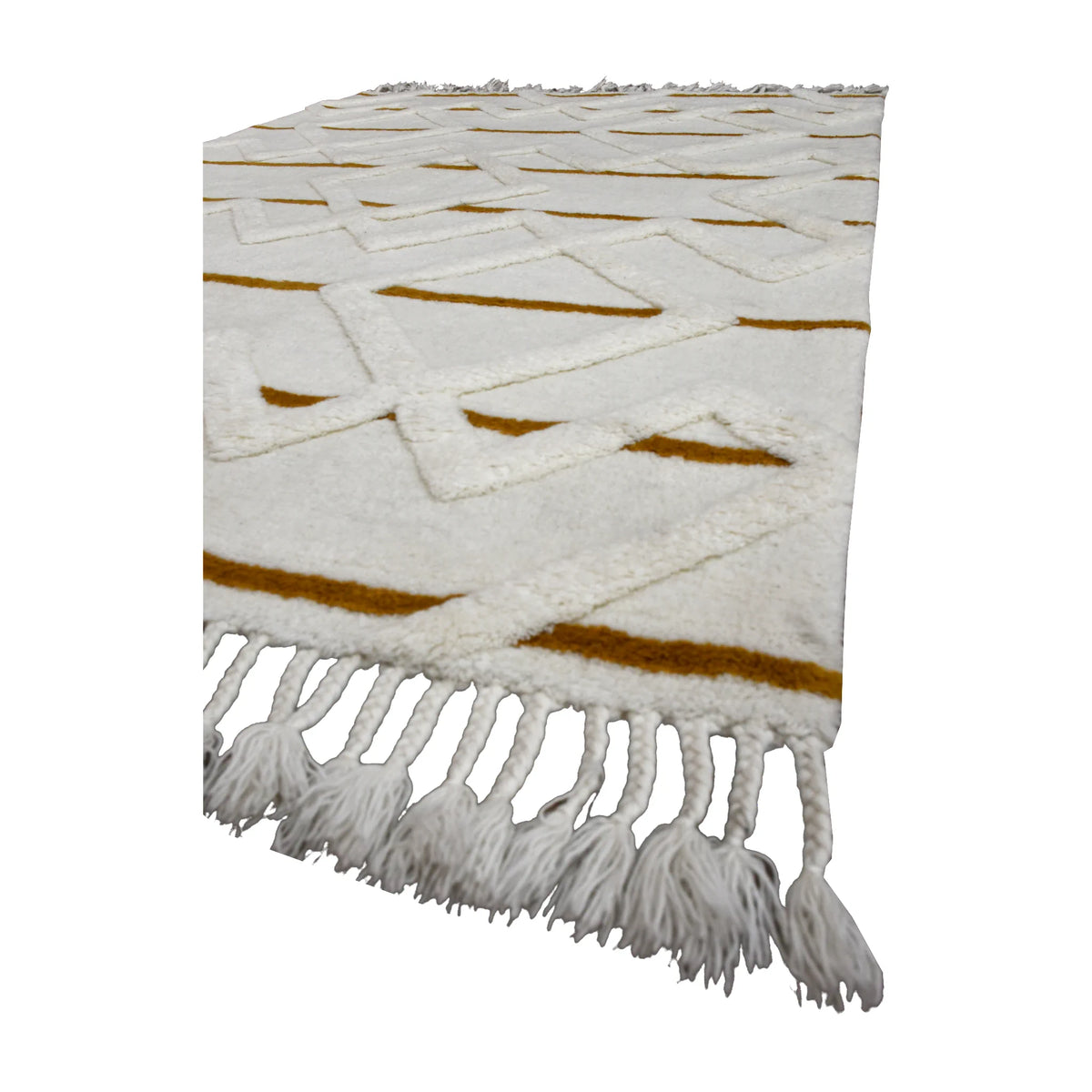 Angled view of cream and mustard hand-tufted wool rug showing its sculpted pile, geometric lines and knotted tassel fringe