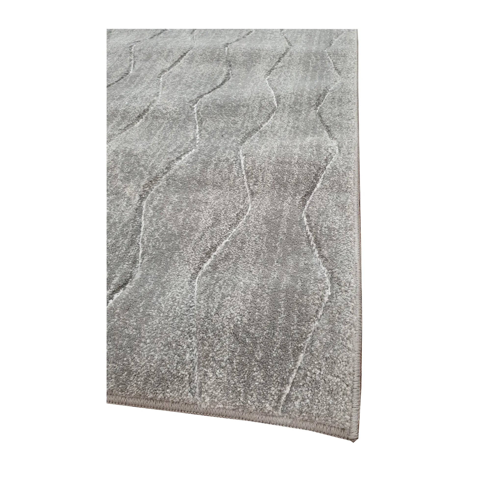 Edge detail of Denver Grey Abstract Runner Rug showing textured grey surface and abstract charcoal linework