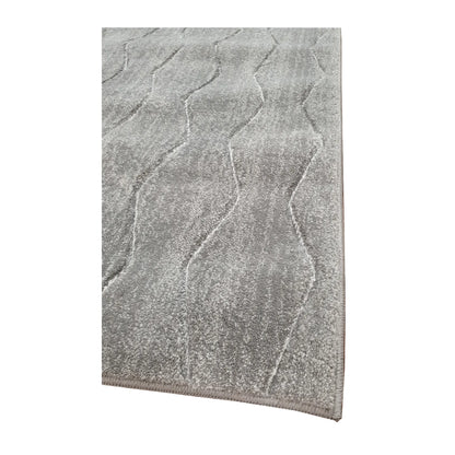 Edge detail of Denver Grey Abstract Runner Rug showing textured grey surface and abstract charcoal linework