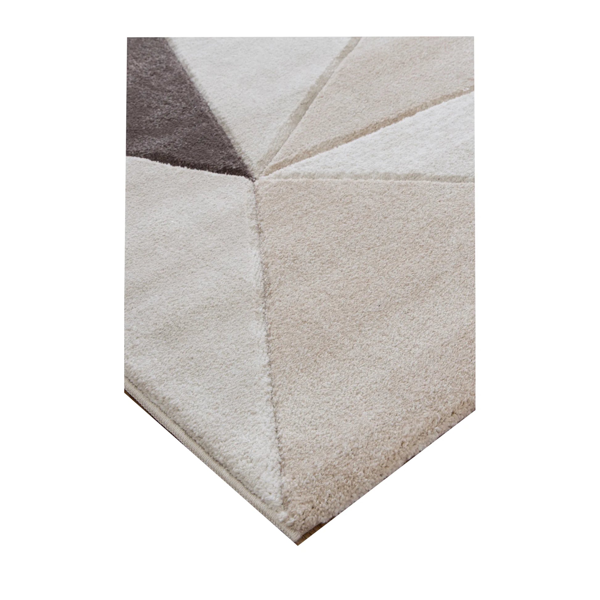 Corner detail of Denver ivory brown geometric rug showing carved pile texture