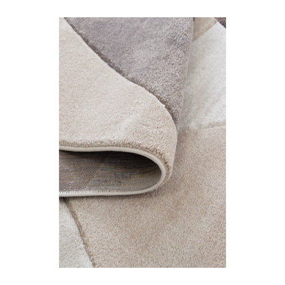 Folded edge detail of Denver ivory brown rug showing soft pile and backing