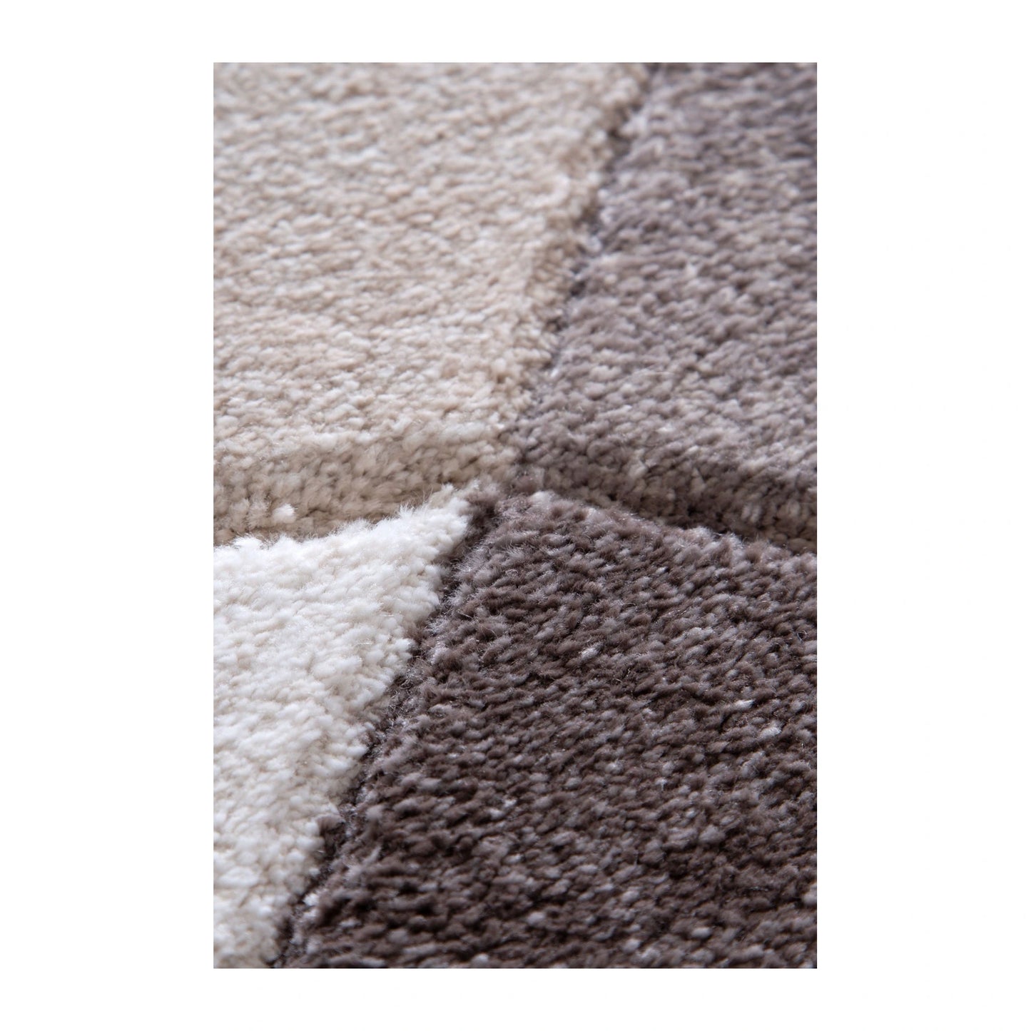 Texture detail of Denver ivory brown geometric rug showing raised surface pattern