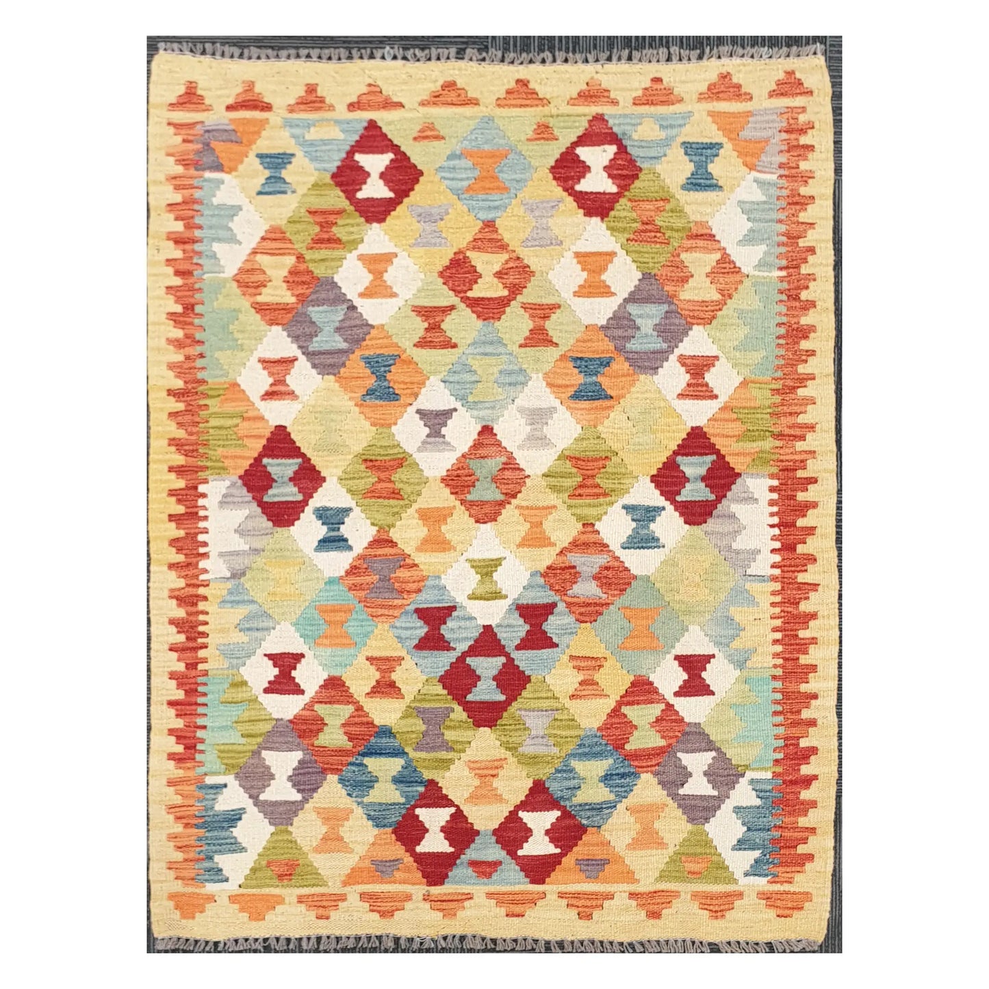 Full view of Afghan Chobi Kilim rug with multicolour diamond mosaic on an ivory ground, 137 x 100 cm