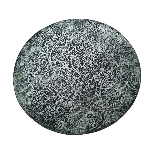 Full view of emerald and charcoal round rug with botanical scroll pattern, 160 cm