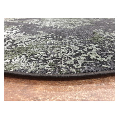 Low-angle close-up of emerald round rug showing surface texture and vintage-style design, 160 cm