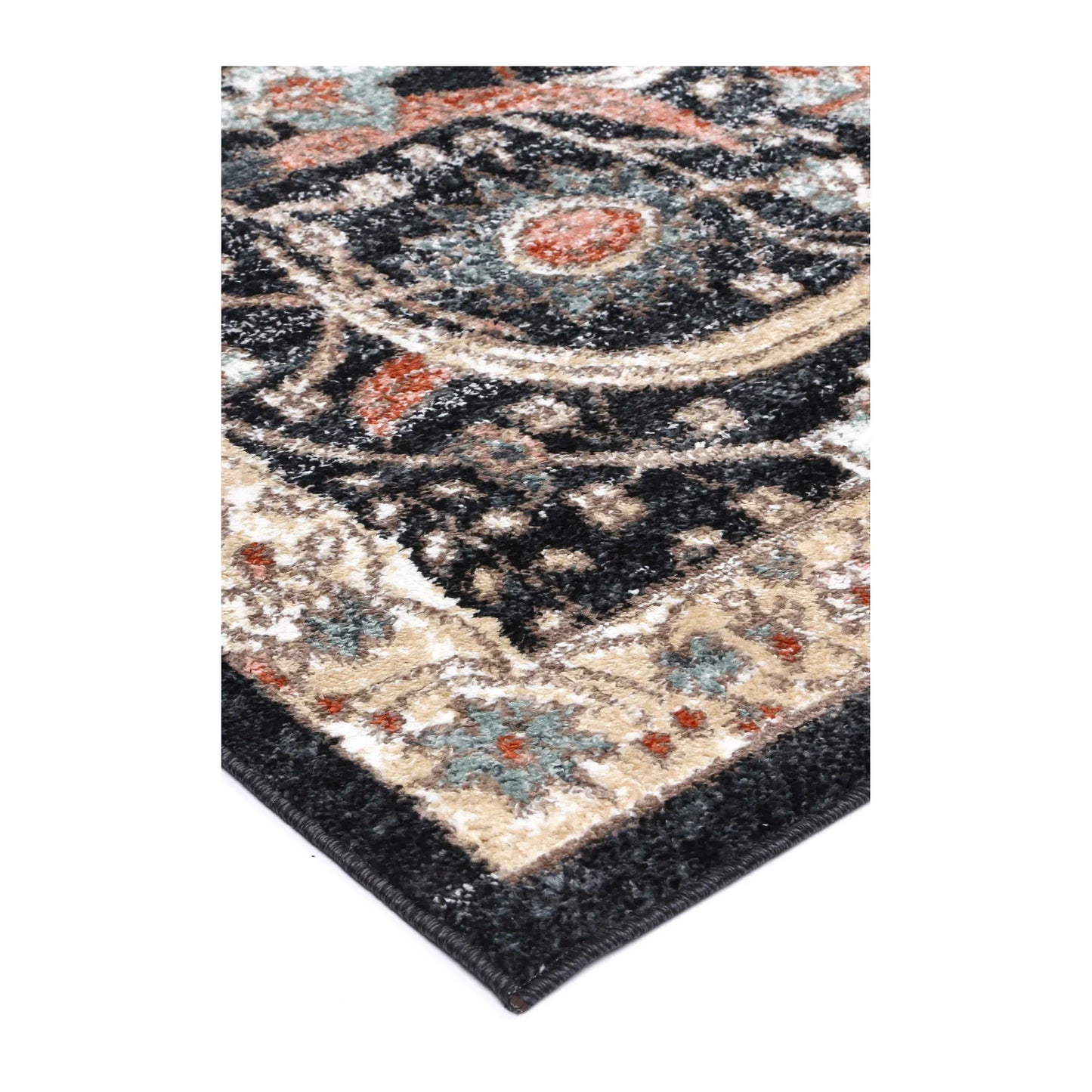 Corner detail of Estate Charcoal rug showing bound edge, polypropylene pile and ornate border pattern, 290 x 200 cm