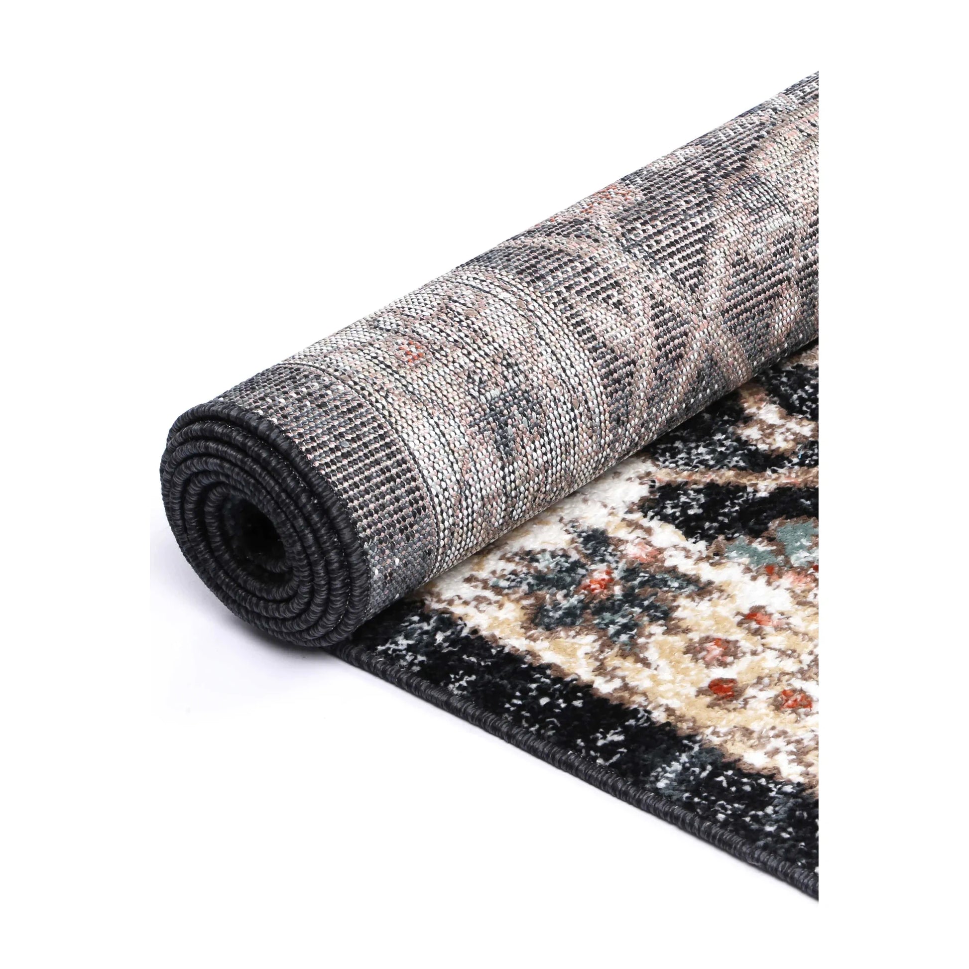 Rolled Estate Charcoal rug showing the woven backing, bound edge and patterned polypropylene pile