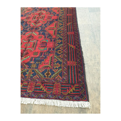 Border and fringe detail of fine Afghan Baluchi hand-knotted wool rug