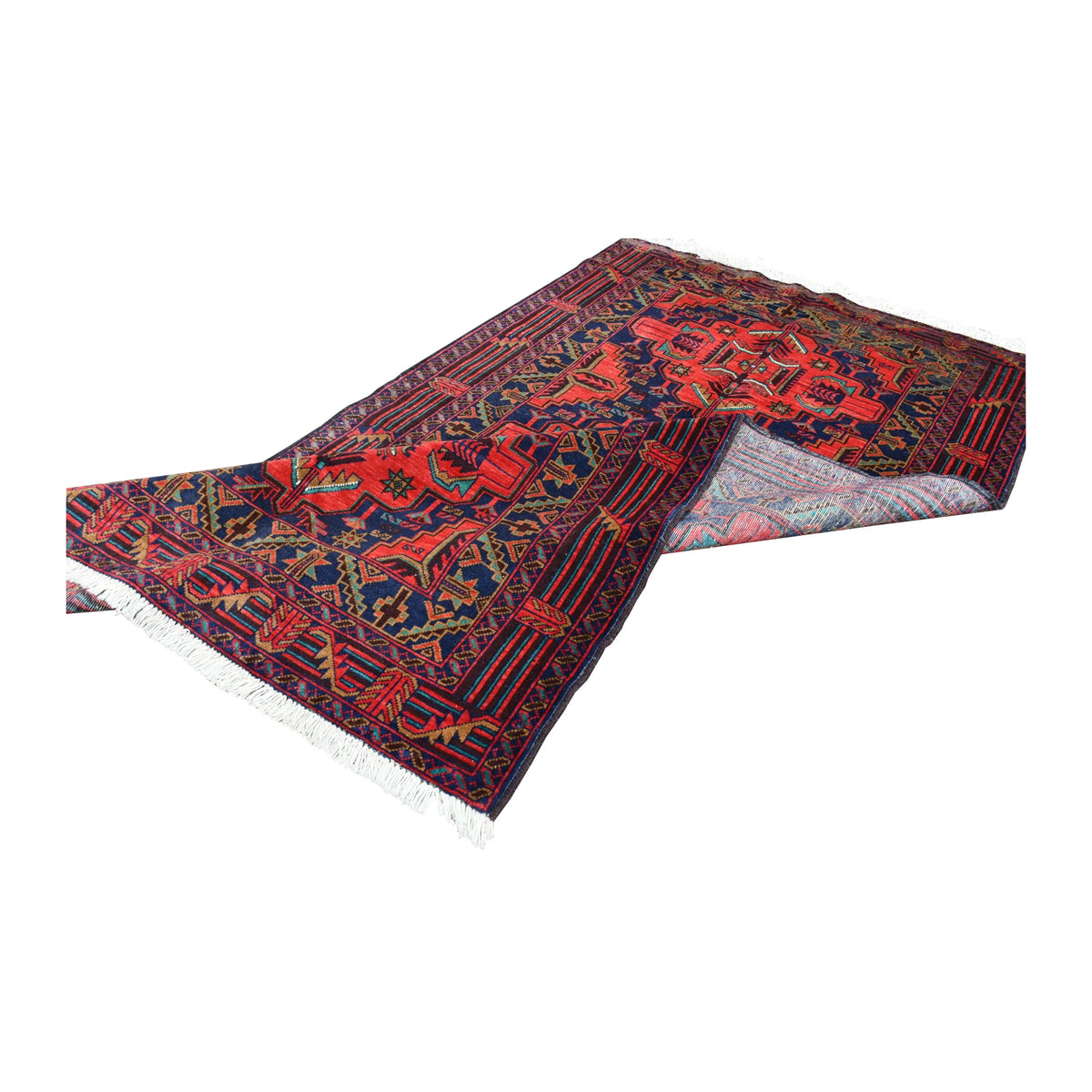 Folded view of fine Afghan Baluchi hand-knotted wool rug showing its patterned pile, borders and fringe