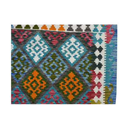 Corner field detail of Fine Afghan Chobi Kilim rug with diamond motifs, border detail and flatwoven texture