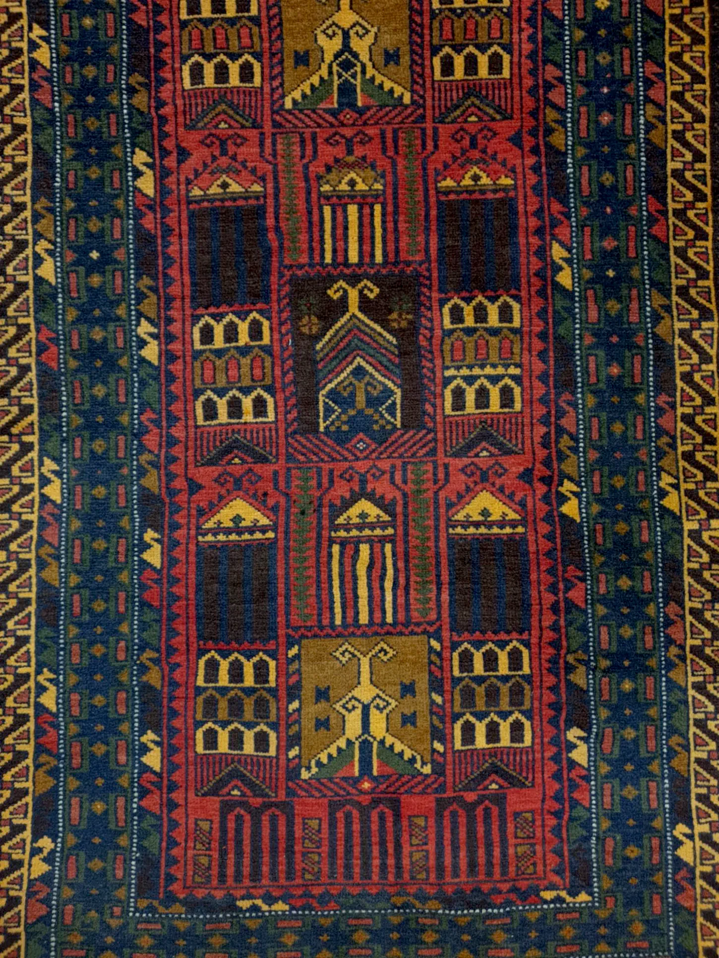 Fine Baluchi hand-knotted wool rug pattern detail
