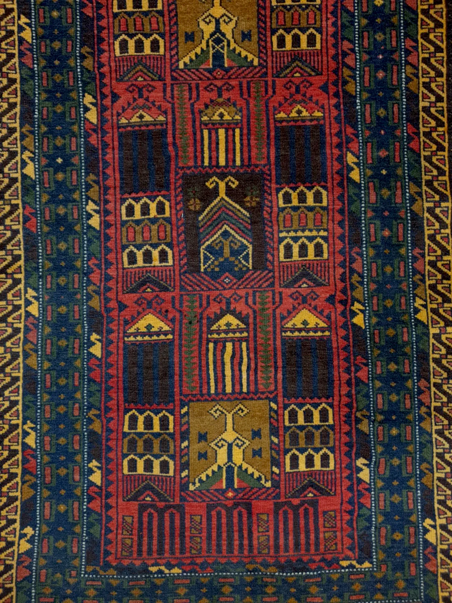 Fine Baluchi hand-knotted wool rug pattern detail