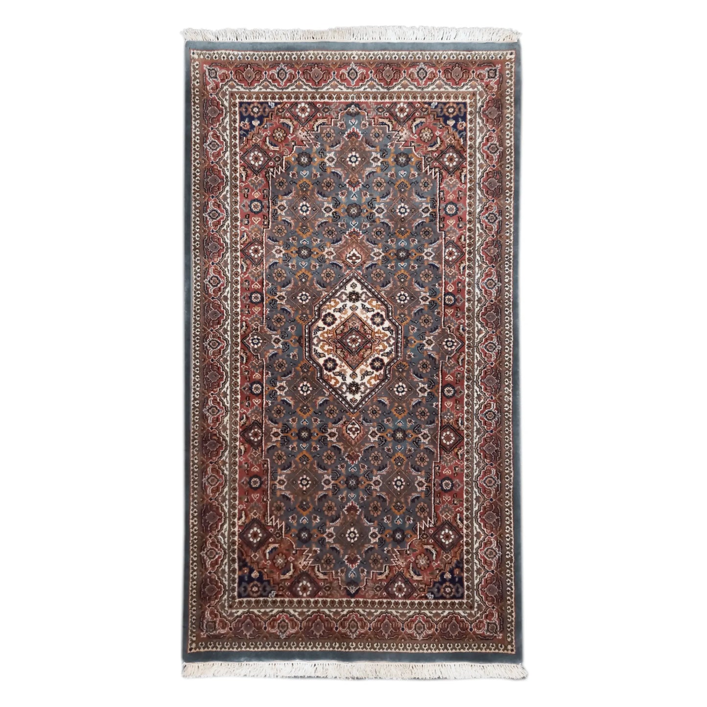 Full view of Fine Bidjar hand-knotted wool rug with central diamond medallion, dense floral field and layered rust-toned borders, 162 x 92 cm
