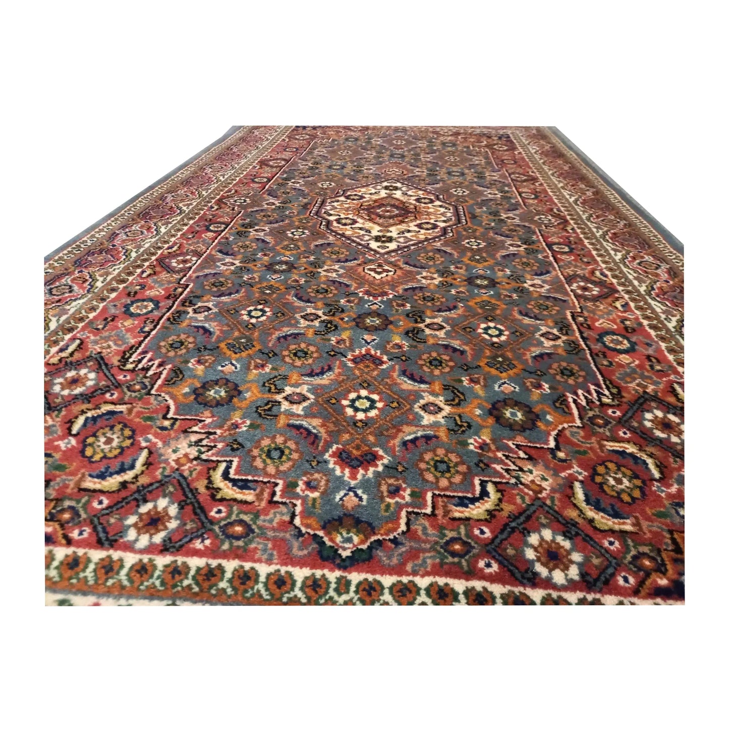 Close-up of Fine Bidjar rug showing the central medallion, dense floral motifs and lower border detail