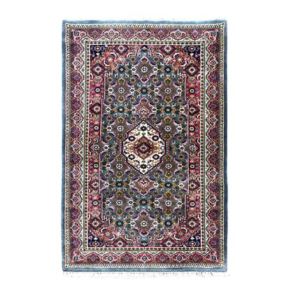 Full view of Fine Bidjar wool rug with blue-grey floral field, ivory central medallion and muted red borders, 162 x 92 cm