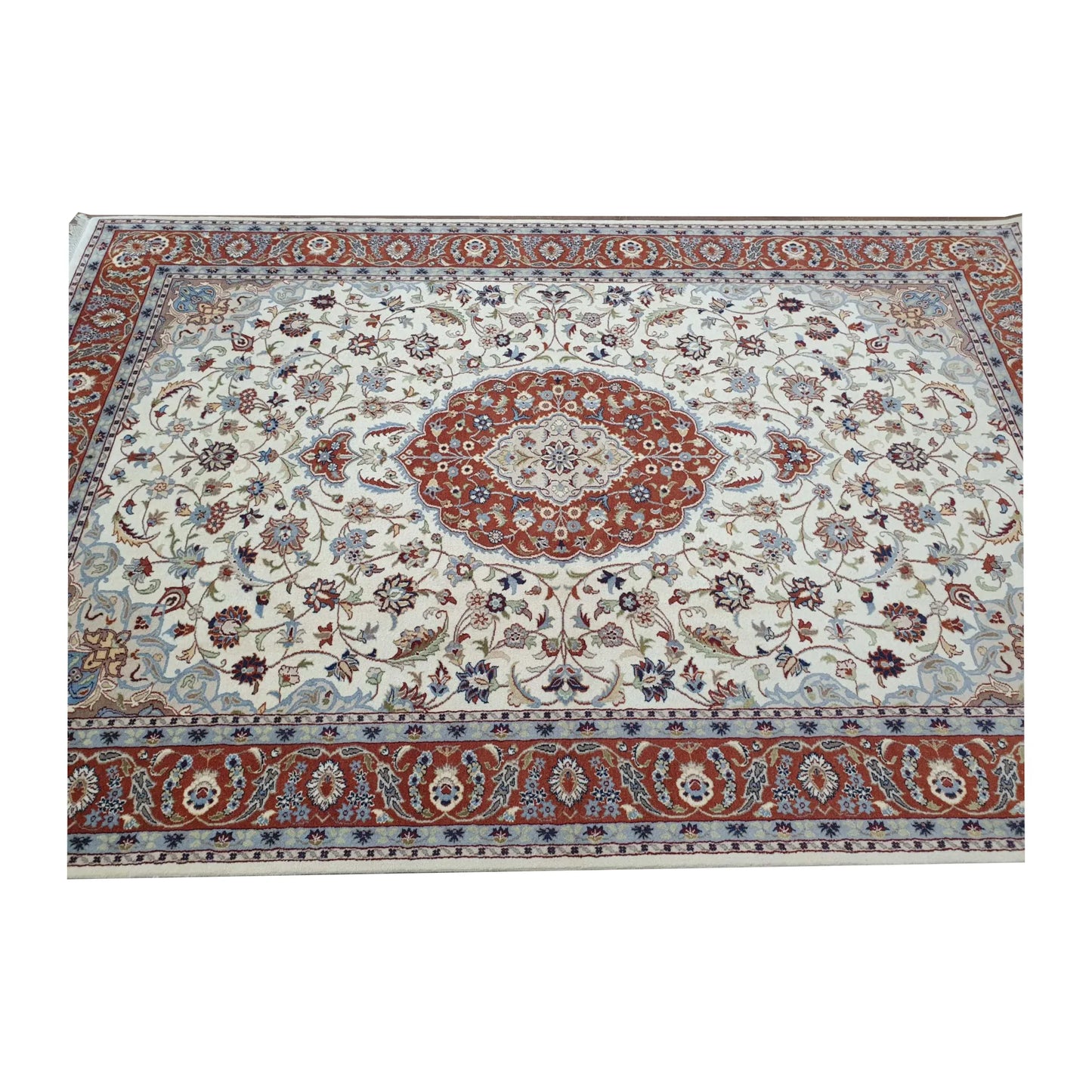 View of Fine Tabriz rug showing the central red medallion, beige floral field and red border