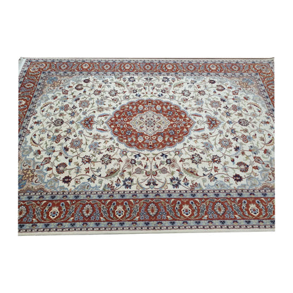 View of Fine Tabriz rug showing the central red medallion, beige floral field and red border