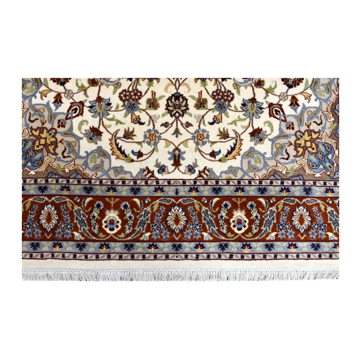 Fringed end of Fine Tabriz rug showing small floral vines above its wide rust-red patterned border