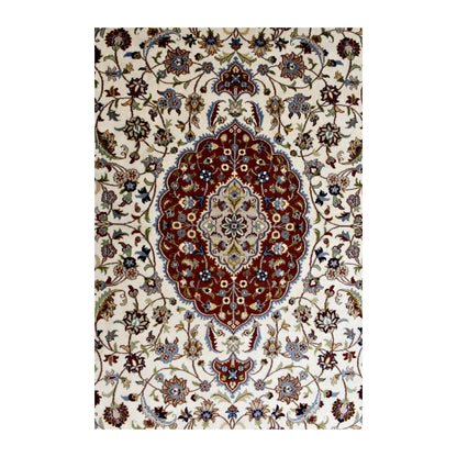Central rust-red medallion surrounded by the beige floral field and muted blue details of the Fine Tabriz rug