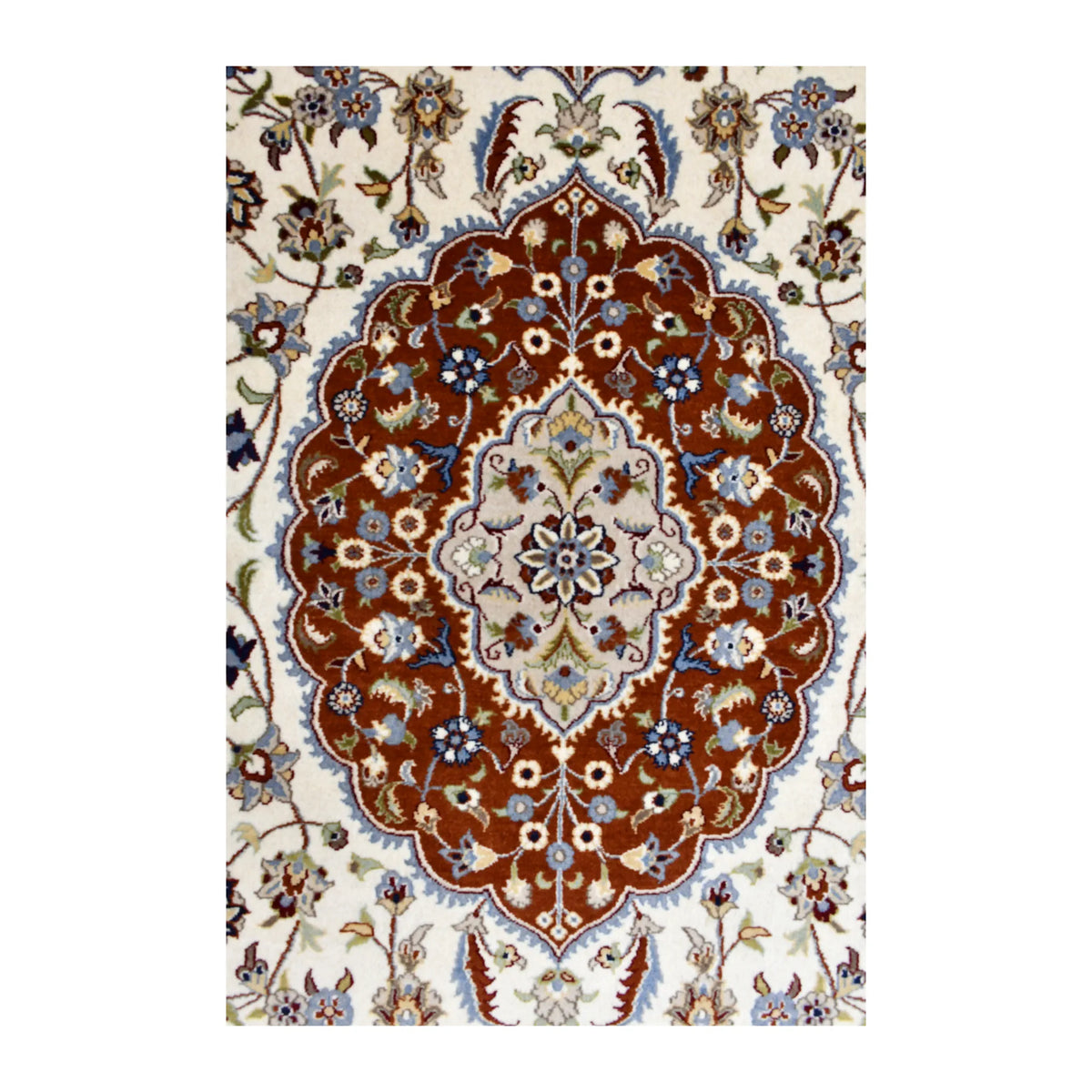 Close-up of the Fine Tabriz rug’s ornate rust-red medallion with a pale floral centre and blue accents