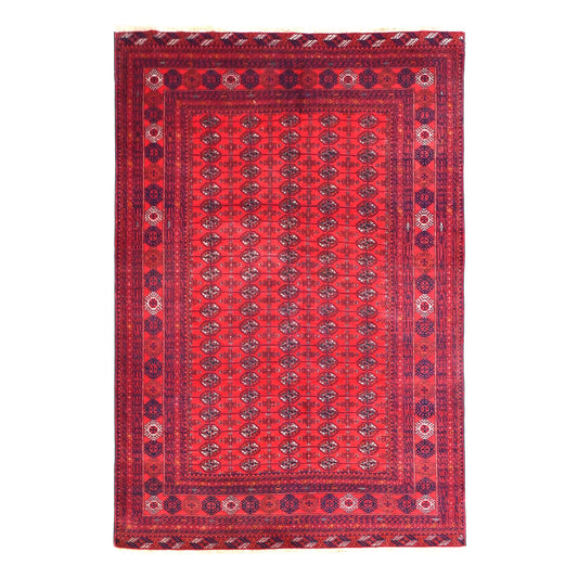 Full view of Fine Turkmen Tekke hand-knotted wool rug with a deep red field, rows of dark gül motifs and geometric borders, 286 x 196 cm