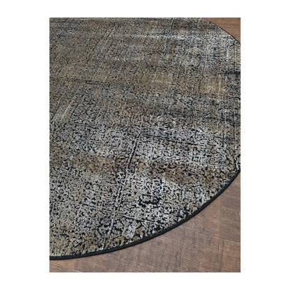 Angled detail of gold and taupe round rug showing textured pattern and edge finish, 160 cm