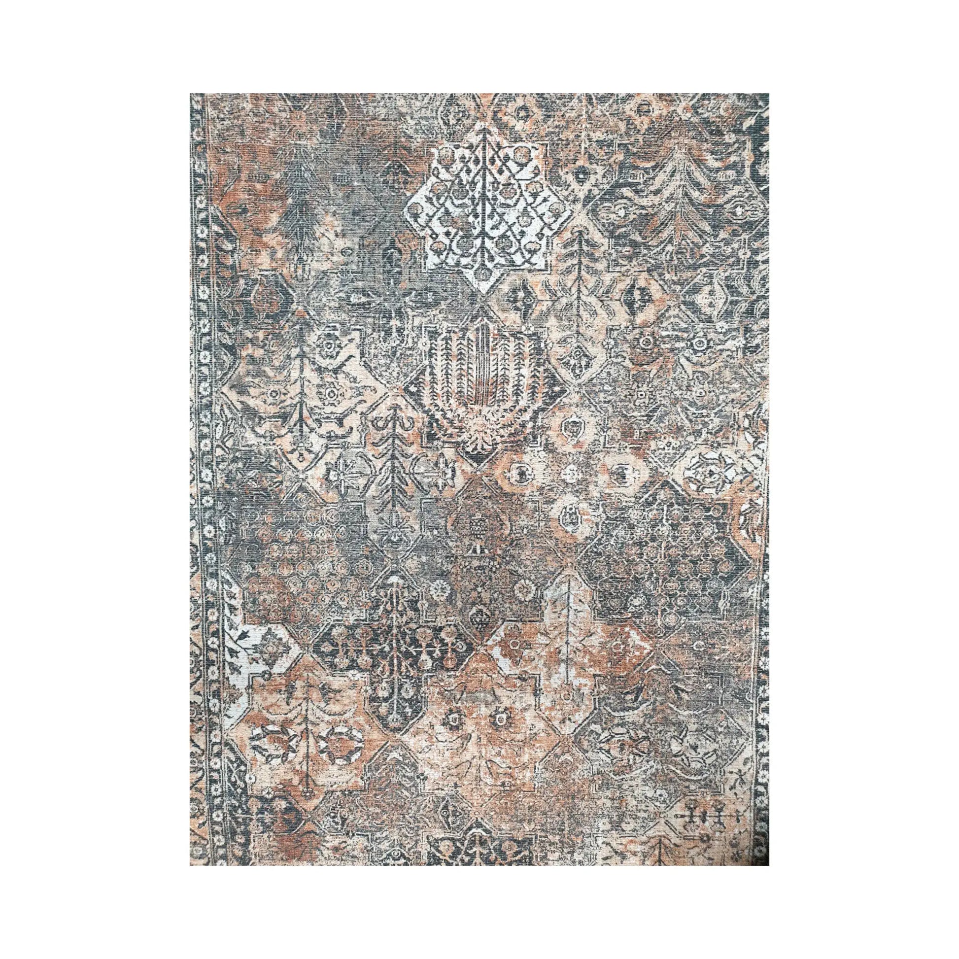 Close-up of grey rust cotton rug central medallion and floral ornamental pattern