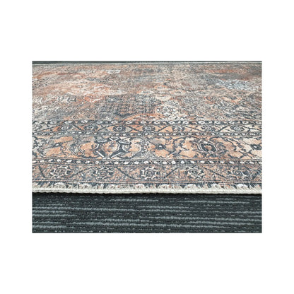 Low-angle close-up of grey rust cotton rug border edge and woven surface texture