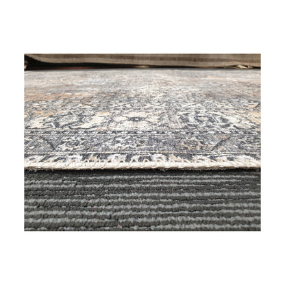 Low-angle detail of cotton rug edge, woven texture and surface finish