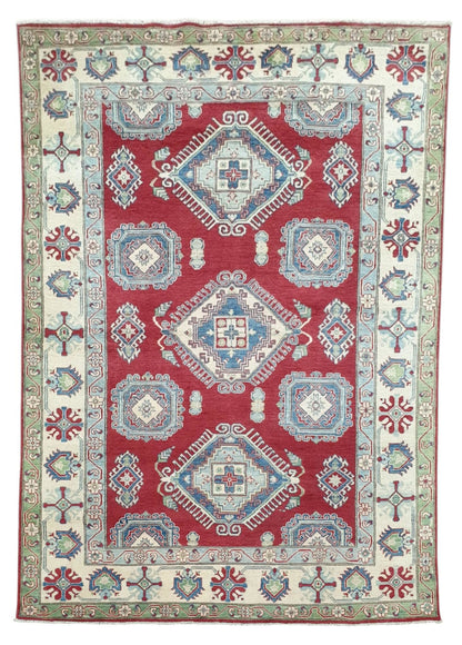 Large hand-knotted Kazak wool rug with traditional red and cream geometric patterns, size 298 x 196 cm, from Silk Road Rugs.