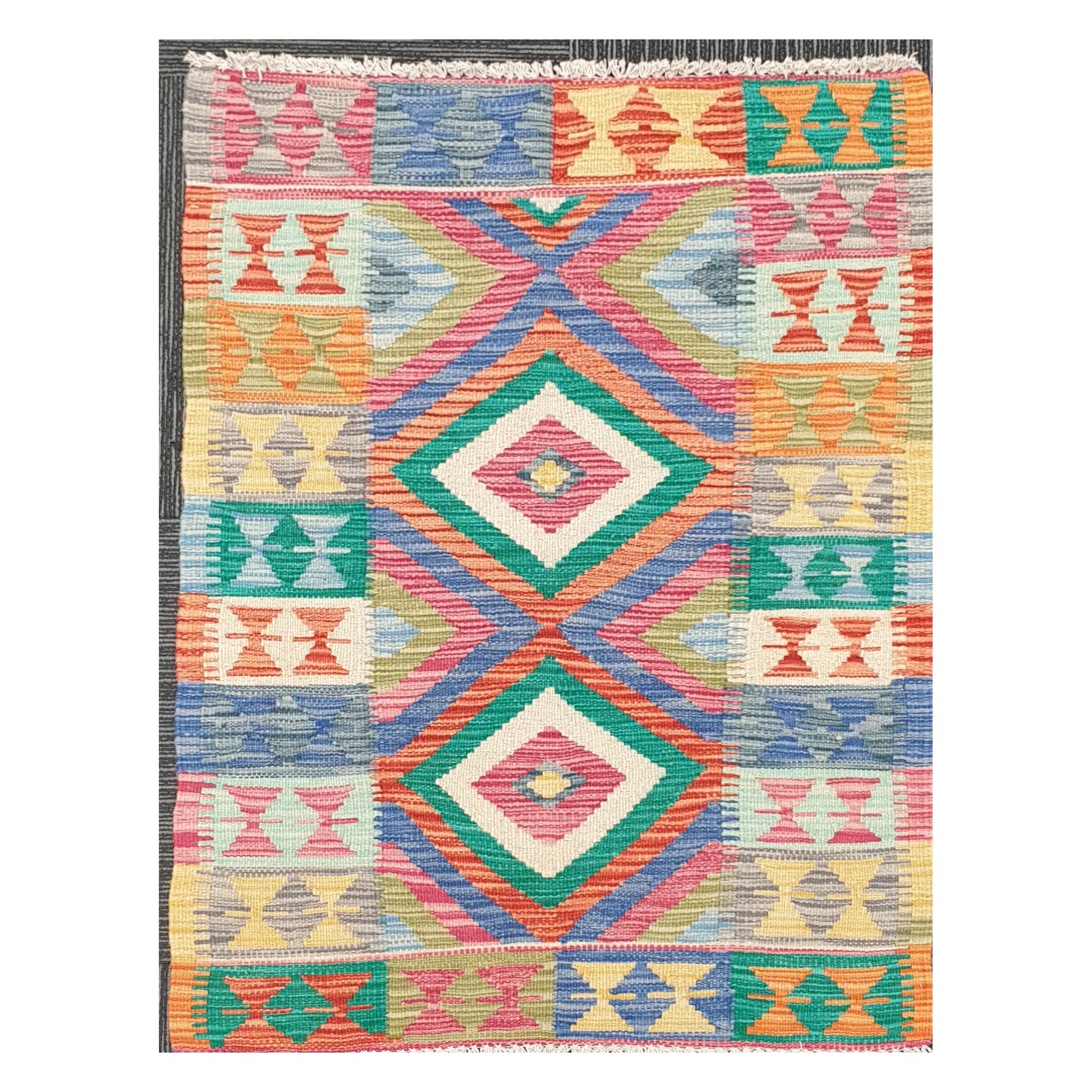 Full view of handwoven Afghan Chobi Kilim rug with multicolour stacked diamond panel on an ivory ground, 109 x 80 cm