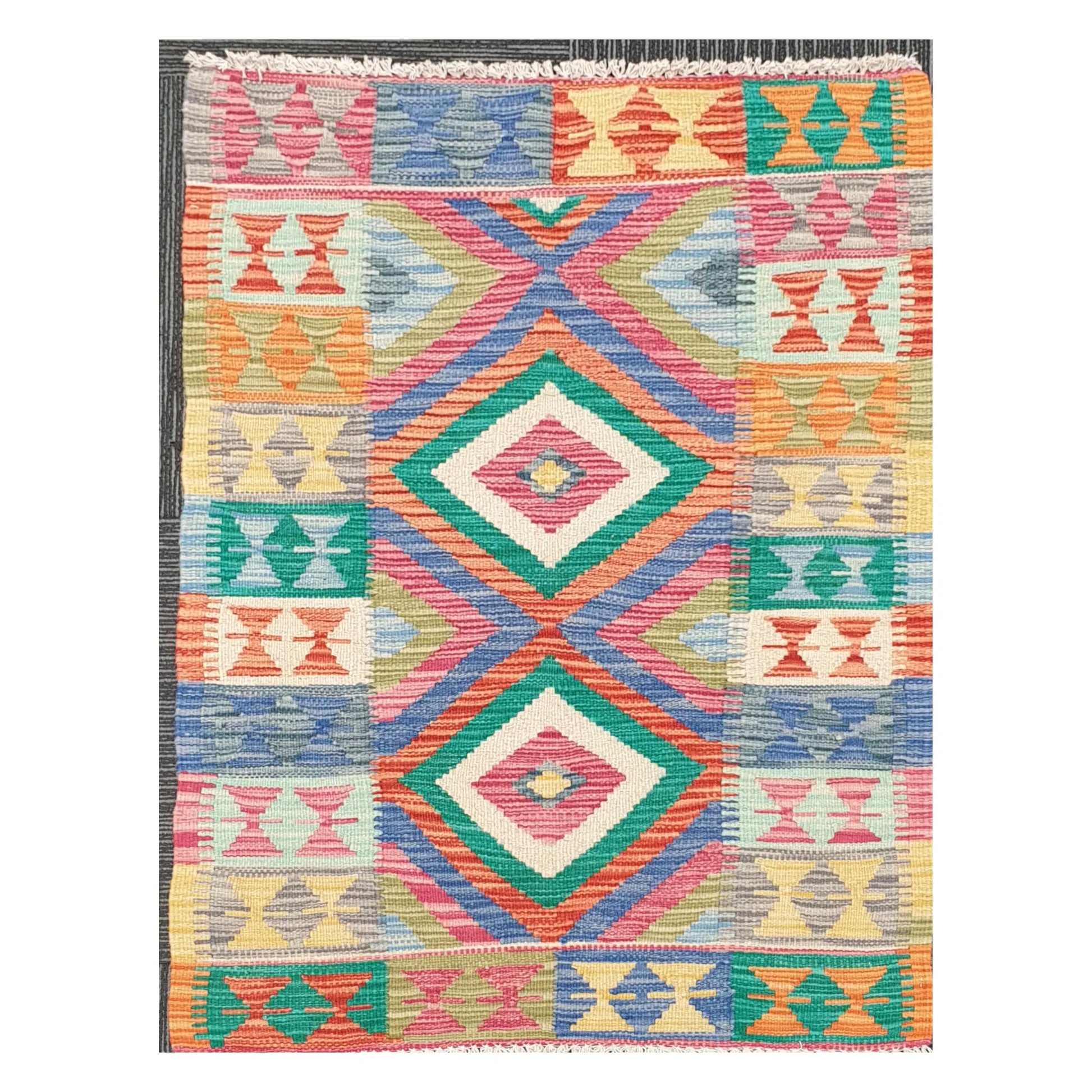 Full view of handwoven Afghan Chobi Kilim rug with multicolour stacked diamond panel on an ivory ground, 109 x 80 cm