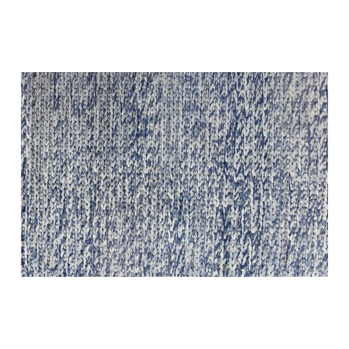 Field detail of Harlow hand-tufted wool rug showing layered blue and grey tones across the textured pile