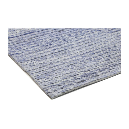 Corner detail of Harlow blue wool rug showing tonal texture