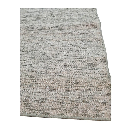 Edge detail of Indian Dhurrie rug showing fine off-white, charcoal and beige flatwoven texture