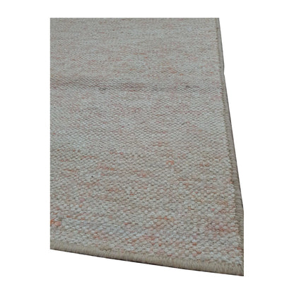 Edge detail of Indian Dhurrie runner showing off-white flatweave texture with subtle pale peach variation