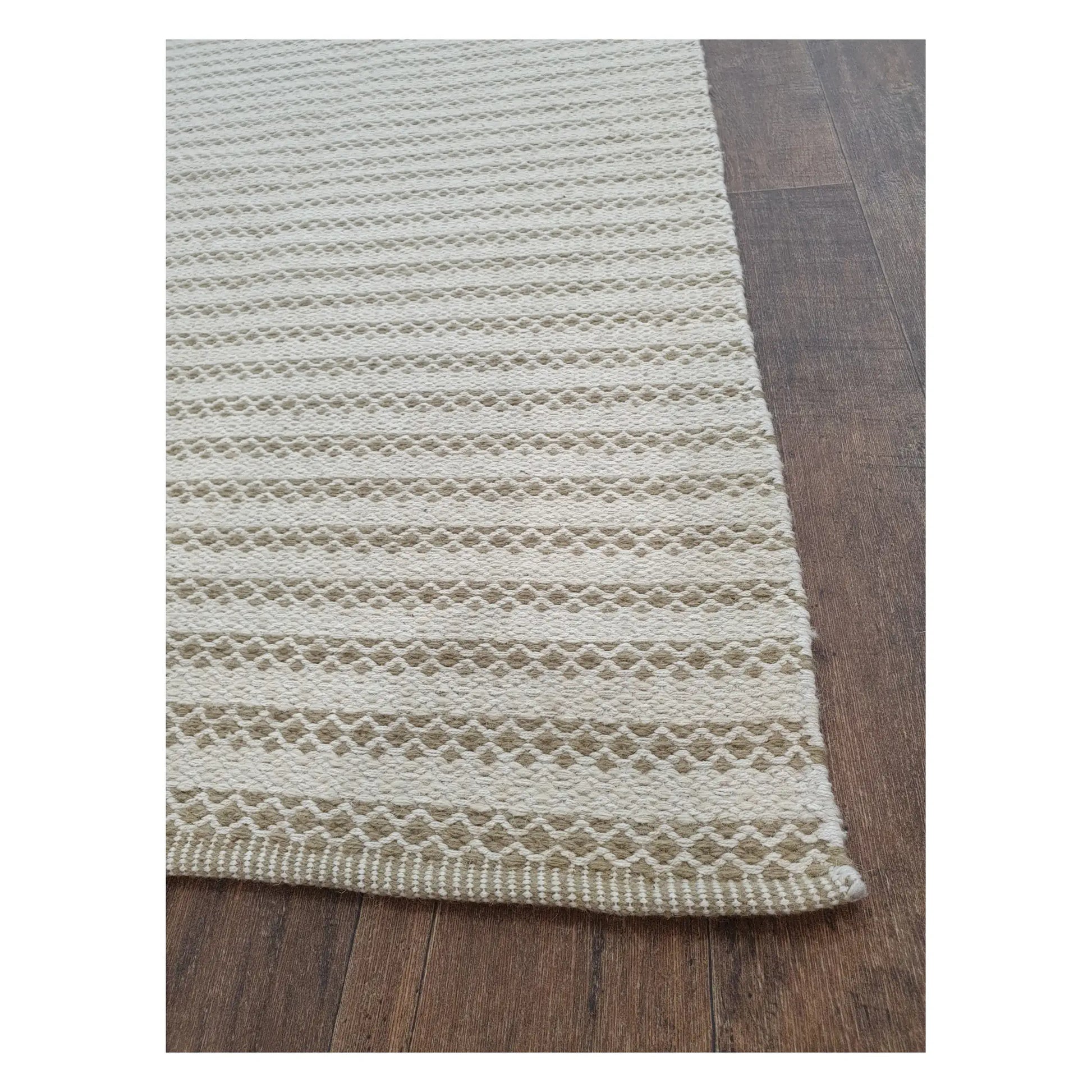 Angled edge detail of Indian Dhurrie showing limestone woven pattern and flatweave texture, 290 x 200 cm