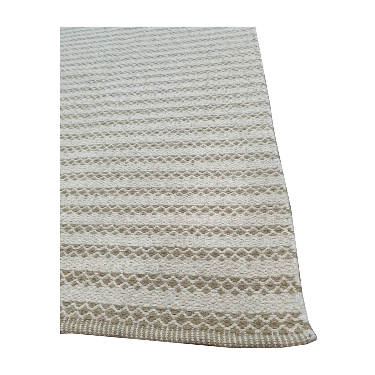 Angled edge detail of Indian Dhurrie showing limestone woven pattern and flatweave texture, 290 x 200 cm