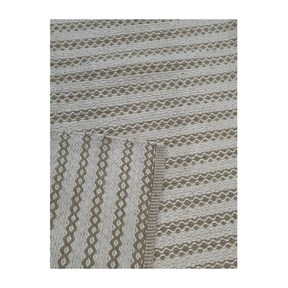Close-up of folded Indian Dhurrie rug showing limestone woven pattern detail, 290 x 200 cm 
